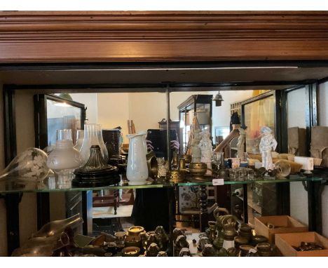 Assorted collectors' items to include oil lamp parts, Continental figures, a moulded glass ink well, etc.