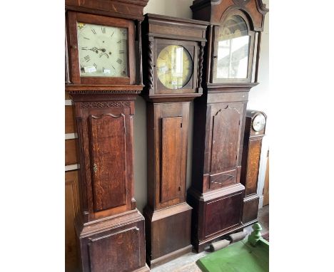 JOHN WARD; an oak cased eight day longcase clock, the brass dial set with Roman numerals, within a later oak case, the hood w