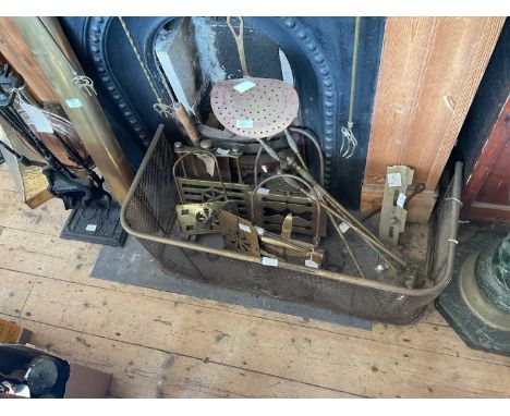 A collection of 19th century and later metalware to include copper bed warmers, cast iron companion sets, assorted fire tools