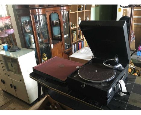 COLUMBIA; a vintage wind up gramophone, with an album of 78rpm vinyl records.