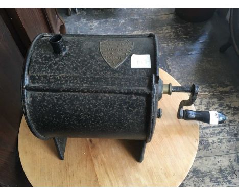 ALWAY &amp; SONS DAIRY UTENSIL MAKER WHITE LIONS, LONDON; a black metal churn, with turned wooden handle, length 45cm.