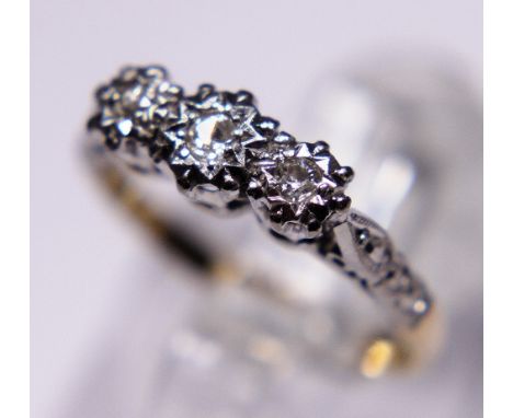 18ct gold and platinum three stone diamond ring