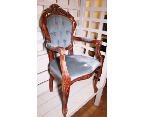 Blue upholstered button back elbow chair