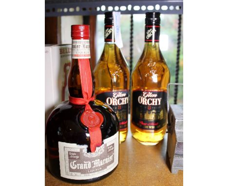 Two bottles of Glen Orchy 8 year old Scotch whisky and Grand Marnier liquor, all sealed