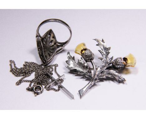 Hallmarked silver Scottish thistle brooch set with yellow stones, silver crucifix and a marcasite ring