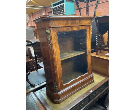 A Victorian walnut pier cabinet, with glazed door enclosing one shelf, on plinth base, height 105cm, width 80cm, depth 32cm.
