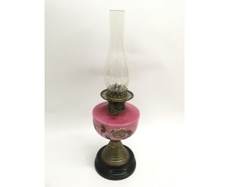 A painted glass oil lamp