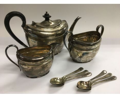 A matching three piece silver tea service and six silver plated teaspoons, different hallmarks.