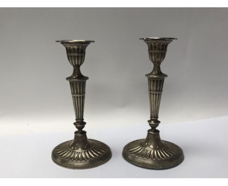 A pair of silver candlesticks awarded to H.N Knox KNGTT, the head constable of Dover in November 1902 for valued service in t