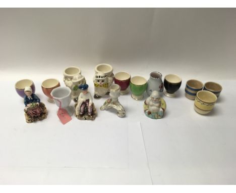 A small collection of China oddments, including a Buddha figure, Poole piece and others. Contained within a Solingen briefcas