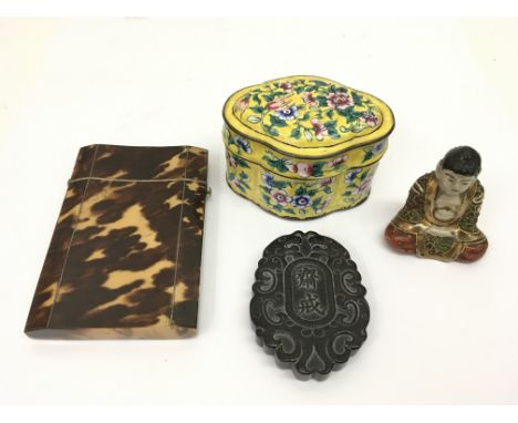 A tortoiseshell card case, yellow cloisonné covered pot, Chinese carved wood seal and small buddha