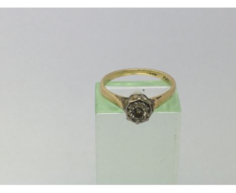 A gold ring set with a solitaire diamond, approx 2.2g and approx size K.