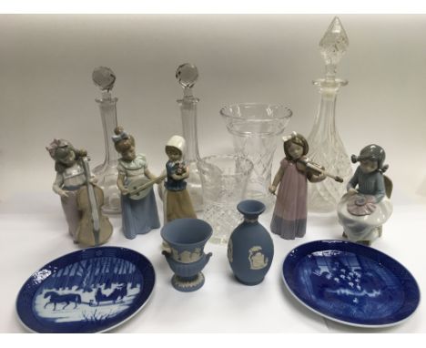 Four Nao figures plus one other similar, three glass decanters, a pair of Royal Copenhagen plates etc.