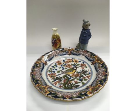 A Royal Worcester bud vase with painted decoration of fruit, approx height 4.5cm, a Dutch painted wall plate decorated with a