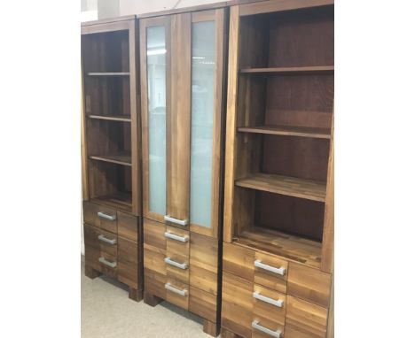 A modern design German three sectional display cabinet with Crome fittings the central section with opaque glass above drawer