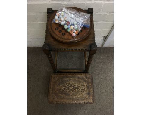 A plant stand, carved foot stool and solitaire set