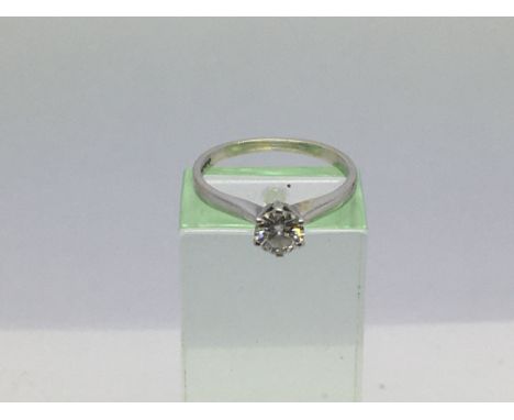 A 9ct white gold ring set with a forty point solitaire diamond, approx 1.8g and approx size K.