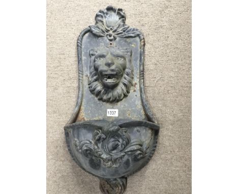 A cast metal Continental wall trough or fountain with a raised lion mask. 70cm.