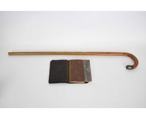 A leather wallet with inscription from Warranted Officers Bow Street 1927 together with photo and walking stick with silver t