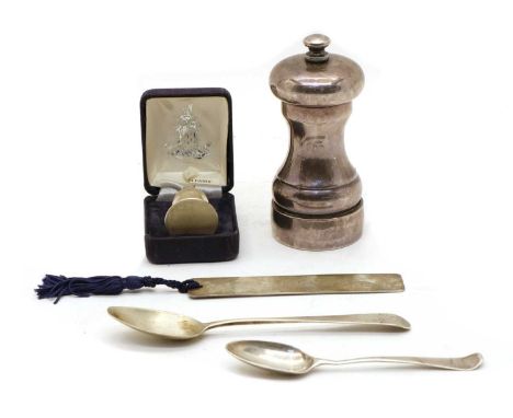 A silver pepper mill, London 1986, 10.5cm high, together with two silver teaspoons, a silver bookmark, by Harrison Brothers &