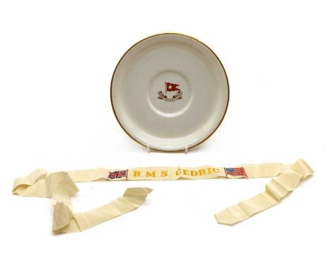 R M S Cedric, a White Star Line plate and Sailor's Cap Tally for R M S Cedric, plate 19cm diameter (2)Condition report: The p
