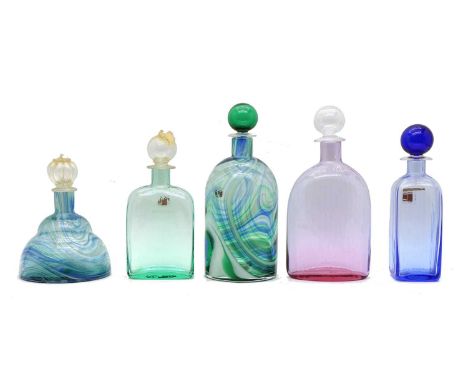 Five Murano coloured glass decanters, mid to late 20th Century, four by Carlo Moretti and one by Vetri Murano, the largest 29