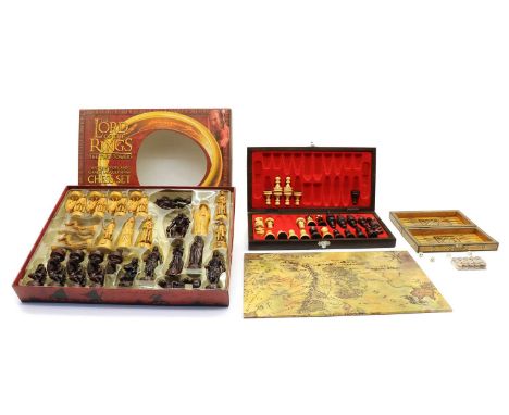 An assortment of chess sets, comprising Star Wars Episode I, Lord of the Rings The Two Towers, Lexibook Chess light, The Ches