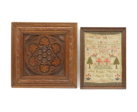 A Victorian needlework sampler, decorated with trees and birds below the alphabet, by Ann Rebecca Marshall, Aged 12 years, Ju