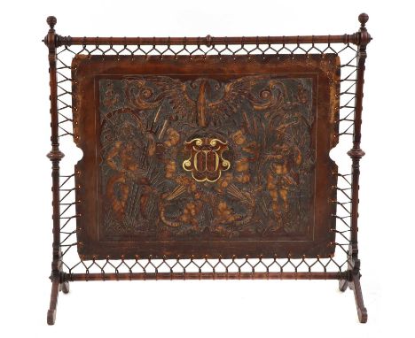 An embossed leather and walnut fire screen, late 19th century, the embossed panel with Greek gods Triton and Hermes, flanking