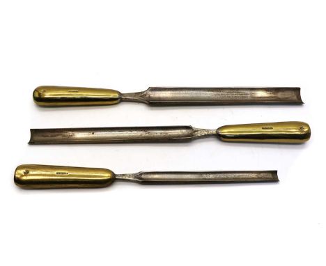 A graduated set of three brass and steel shipwright's gouges, each stamped 'P. Harris &amp; Co Birmingham', with a military b