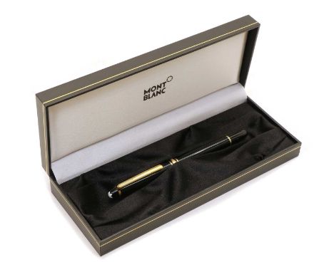 A Mont Blanc rollerball pen, of typical form with a black body and yellow metal fitments, complete in fitted case with servic