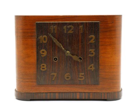 An Art Deco walnut and rosewood mantel clock, striking on a gong, 22cm highCondition report: Case a little worn.Complete with