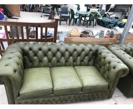 A GREEN BUTTON BACK LEATHER THREE SEATER CHESTERFIELD SOFA 