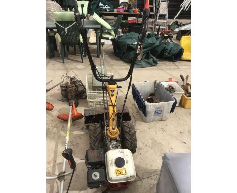 A PETROL ROTOVATOR WITH A HONDA ENGINE IN WORKING ORDER 