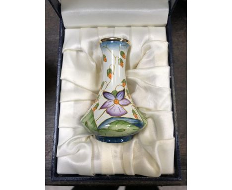 A MOORCROFT BOXED ENAMEL FLORAL PATTERN VASE, FIRSTS 