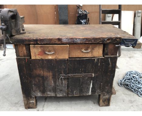 A WOODEN TOOL BENCH WITH TWO DRAWERS AND TWO DOOR UNDER CUPBOARD WITH A AJAX STEEL ENGLAND NO 3 VICE AND A GUARDSMAN VICE 