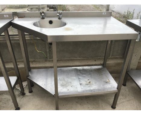 A STAINLESS STEEL UNIT WITH SMALL ROUND SINK AND LOWER SHELF 105CM X 60CM X 95CM 