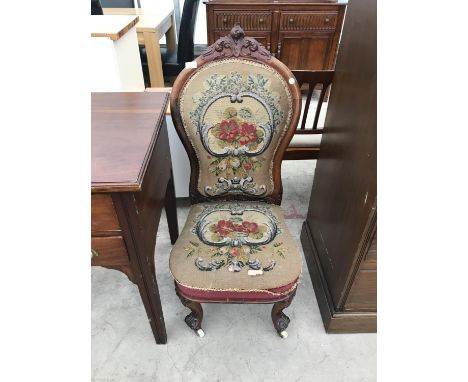 A CARVED MAHOGANY BEDROOM CHAIR WITH DECORATIVE TAPESTRY SEAT AND BACK 