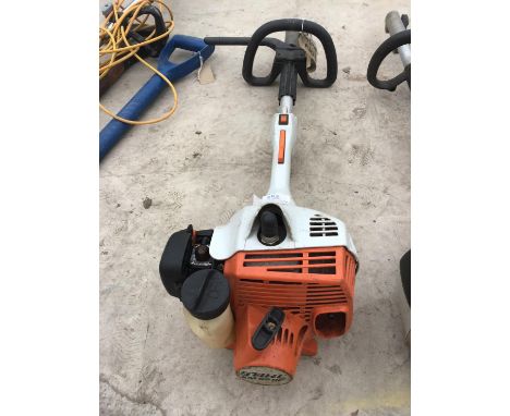 A STIHL KM55RC PETROL ENGINE FOR ATTACHMENTS 