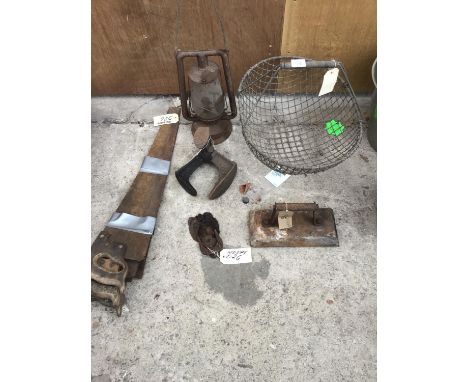 A VINTAGE WIRE POTATO BASKET, STORM LAMP , SHOE LAST, LION DOOR KNOCKER, SAWS ETC 