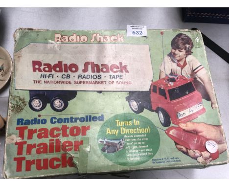 A RADIO SHACK CONTROLLED TRACTOR TRAILER TRUCK 