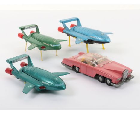 Four Unboxed Dinky Toys Models From TV series ‘Thunderbirds’&nbsp;100 Lady Penelopes FAB 1, repainted/restored, 101 Thunderbi