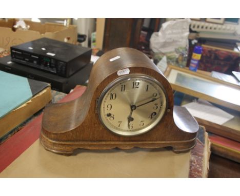 A NAPOLEON HAT MANTEL CLOCK