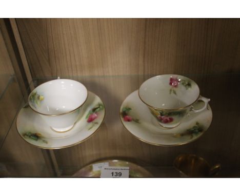 TWO ROYAL WORCESTER CUPS AND SAUCERS