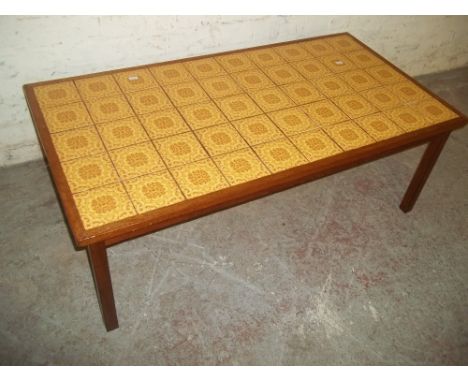 A RETRO TEAK TILE TOPPED COFFEE TABLE