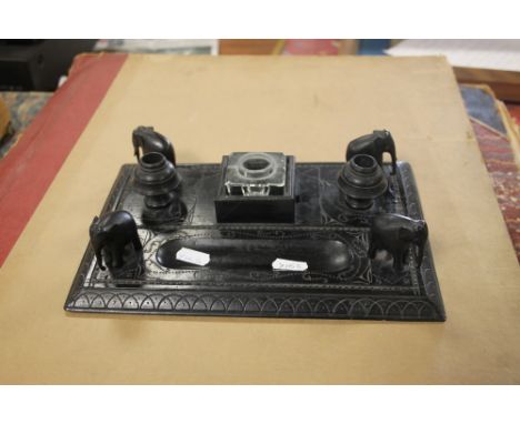 A CARVED INKWELL
