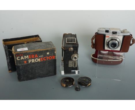 A 1960s Kodak Colorsnap 35 camera together with a 1930s Campro cine camera projector