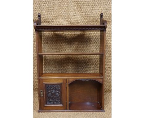 A George V Arts and Crafts influenced mahogany book shelf / cabinet, 95 cm high