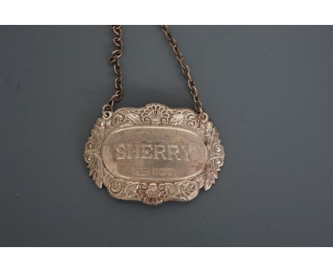 A silver sherry decanter label, Laurence R Watson &amp; Co, Birmingham, 1982