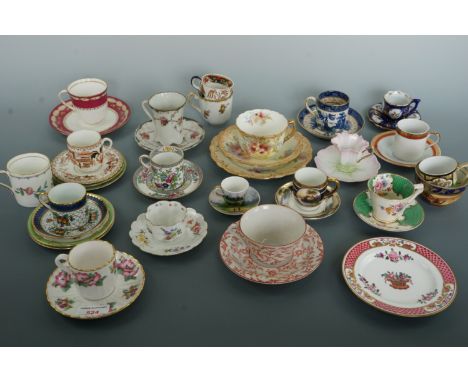 A large collection of cabinet cups and saucers